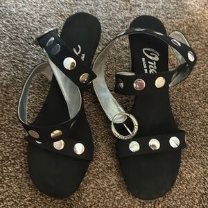 Onex Black Sandals with Metallic Details